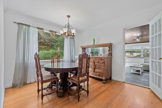 5 Ridgeview Dr, Pleasantville, NY 10570 - dining space with a chandelier, light wood-style floors, and ornamental molding