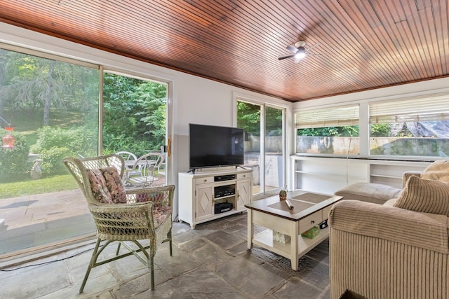 5 Ridgeview Dr, Pleasantville, NY 10570 - sunroom / solarium with stone tile flooring, a ceiling fan, and outdoor dining space