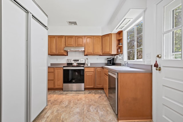 5 Ridgeview Dr, Pleasantville, NY 10570 - kitchen featuring stainless steel appliances, under cabinet range hood, open shelves, and light countertops