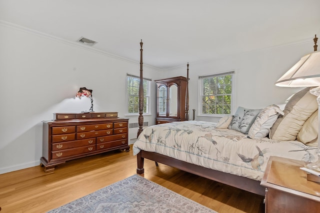 5 Ridgeview Dr, Pleasantville, NY 10570 - bedroom featuring radiator, crown molding, and light wood finished floors