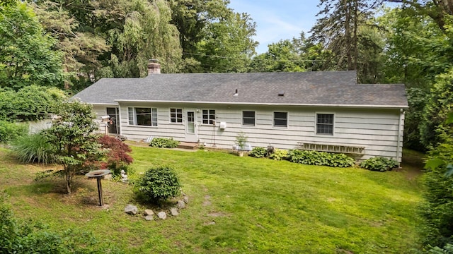 5 Ridgeview Dr, Pleasantville, NY 10570 - back of property with a yard, a chimney, and a shingled roof