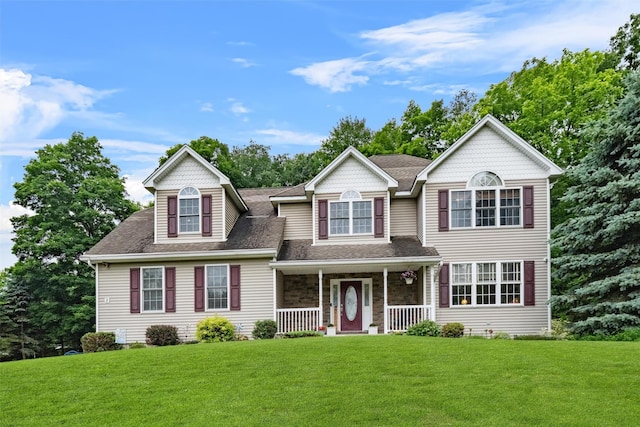 2 SE Ct, Wallkill, NY 12589 - view of front of home featuring a porch, a front lawn, and roof with shingles