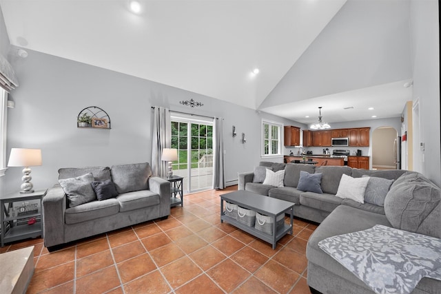 2 SE Ct, Wallkill, NY 12589 - living area with high vaulted ceiling, light tile patterned floors, a chandelier, recessed lighting, and arched walkways