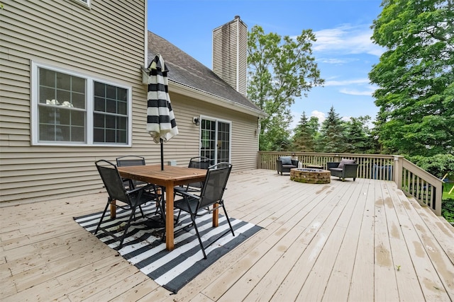 2 SE Ct, Wallkill, NY 12589 - wooden terrace featuring outdoor dining area and an outdoor fire pit