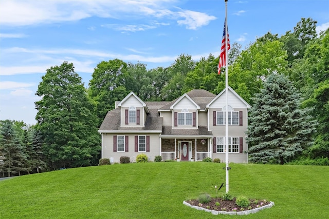 2 SE Ct, Wallkill, NY 12589 - view of front of house featuring a front lawn, a porch, and roof with shingles