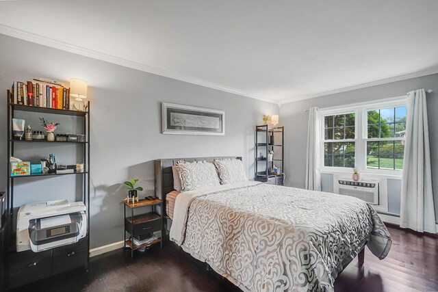 460 Old Town Rd Unit 10A, Port Jefferson Station, NY 11776 - bedroom with ornamental molding, a wall unit AC, and dark wood-style flooring