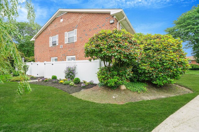 460 Old Town Rd Unit 10A, Port Jefferson Station, NY 11776 - view of property exterior featuring brick siding