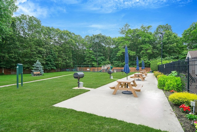 460 Old Town Rd Unit 10A, Port Jefferson Station, NY 11776 - view of property's community featuring a patio area and view of scattered trees