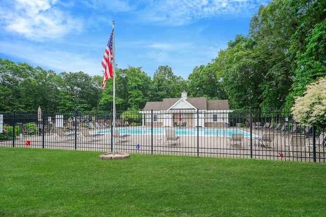 460 Old Town Rd Unit 10A, Port Jefferson Station, NY 11776 - community pool featuring a patio and view of wooded area