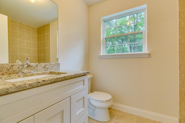 117 Currans, Middle Island, NY 11953 - bathroom with tile patterned flooring, toilet, vanity, and baseboards