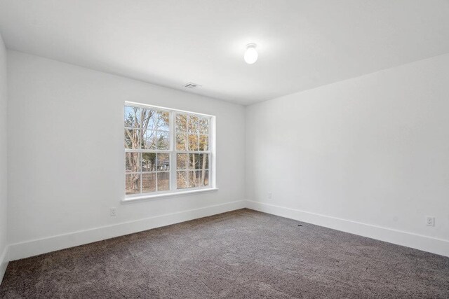 117 Currans, Middle Island, NY 11953 - unfurnished room featuring baseboards and carpet