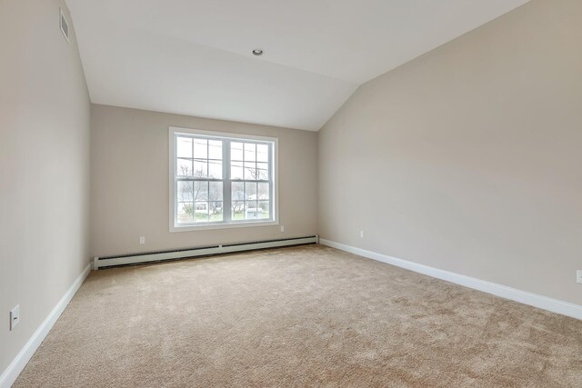 117 Currans, Middle Island, NY 11953 - carpeted empty room featuring baseboard heating, lofted ceiling, and baseboards
