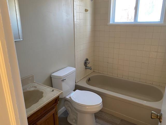 5 Appletree Dr, Saugerties, NY 12477 - bathroom featuring toilet, vanity, and bathtub / shower combination