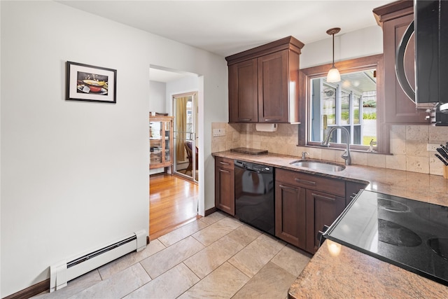 62 Murray Ave, Yonkers, NY 10704 - kitchen featuring black dishwasher, a baseboard radiator, stainless steel microwave, and decorative backsplash