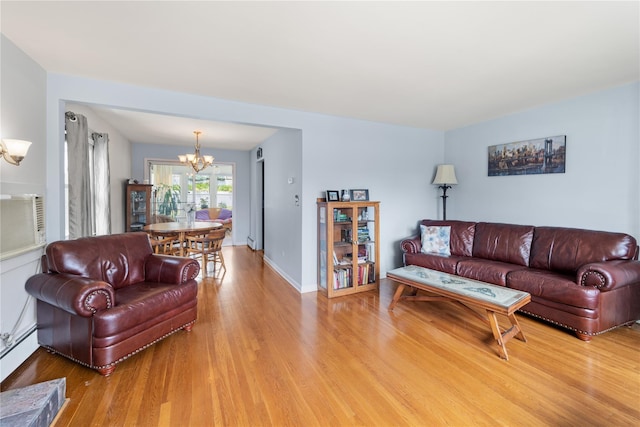 62 Murray Ave, Yonkers, NY 10704 - living area featuring a chandelier and light wood-type flooring