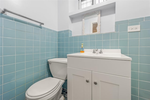 62 Murray Ave, Yonkers, NY 10704 - half bathroom featuring tile walls and vanity
