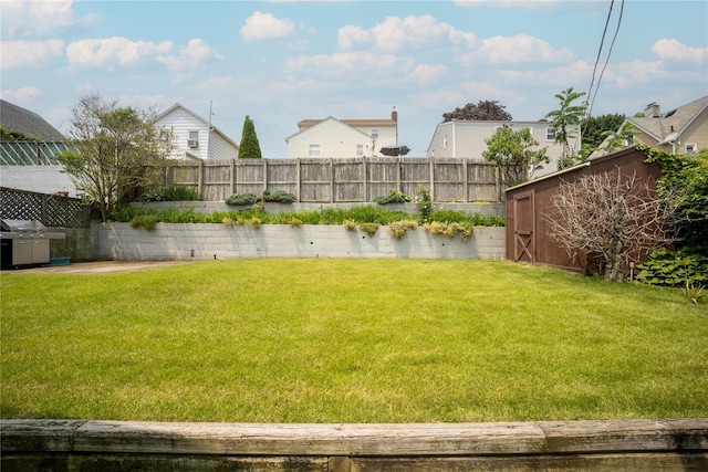 62 Murray Ave, Yonkers, NY 10704 - fenced backyard with a storage shed