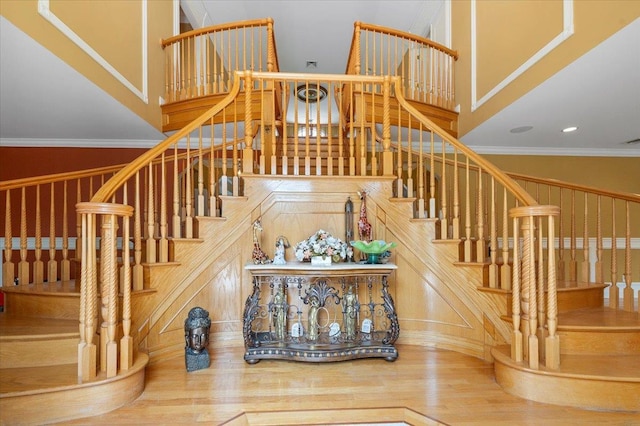 135 Millet St N, Dix Hills, NY 11746 - staircase with a high ceiling, wood finished floors, and recessed lighting