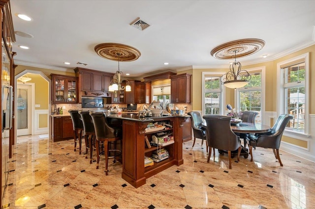 135 Millet St N, Dix Hills, NY 11746 - dining room featuring ornamental molding, a wainscoted wall, recessed lighting, a decorative wall, and arched walkways