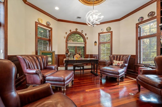 135 Millet St N, Dix Hills, NY 11746 - living room with wainscoting, a chandelier, plenty of natural light, wood finished floors, and ornamental molding