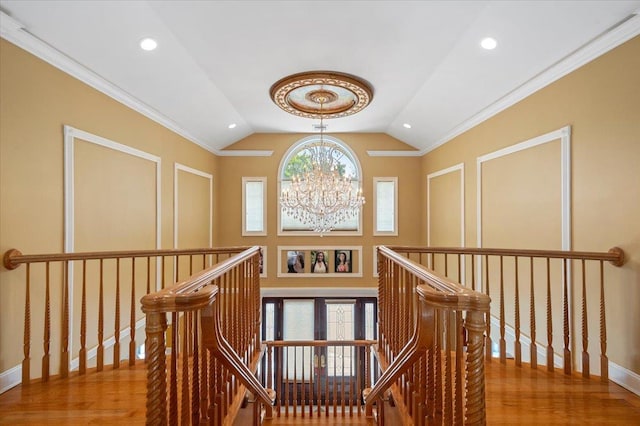 135 Millet St N, Dix Hills, NY 11746 - hall with an upstairs landing, a chandelier, vaulted ceiling, wood finished floors, and recessed lighting