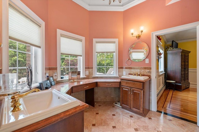 135 Millet St N, Dix Hills, NY 11746 - full bath featuring ornamental molding, a baseboard heating unit, vanity, and wainscoting