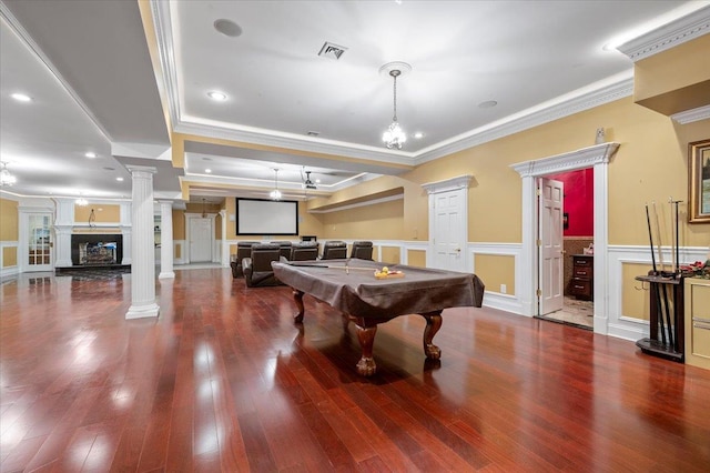 135 Millet St N, Dix Hills, NY 11746 - recreation room featuring decorative columns, ornamental molding, wood finished floors, a wainscoted wall, and a decorative wall