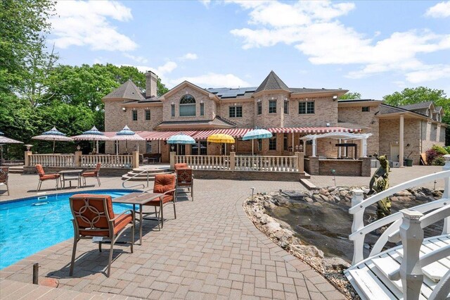 135 Millet St N, Dix Hills, NY 11746 - swimming pool with a patio