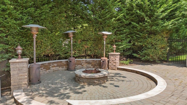135 Millet St N, Dix Hills, NY 11746 - view of patio / terrace featuring an outdoor fire pit