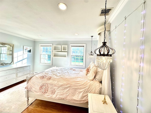 1 Ada Ln, East Setauket, NY 11733 - bedroom with ornamental molding, wood finished floors, and recessed lighting