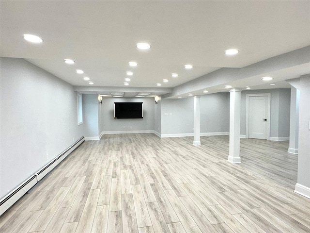 1 Ada Ln, East Setauket, NY 11733 - finished basement with baseboard heating, light wood finished floors, and recessed lighting