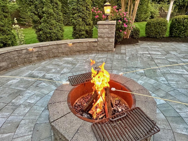 1 Ada Ln, East Setauket, NY 11733 - view of patio / terrace with a fire pit