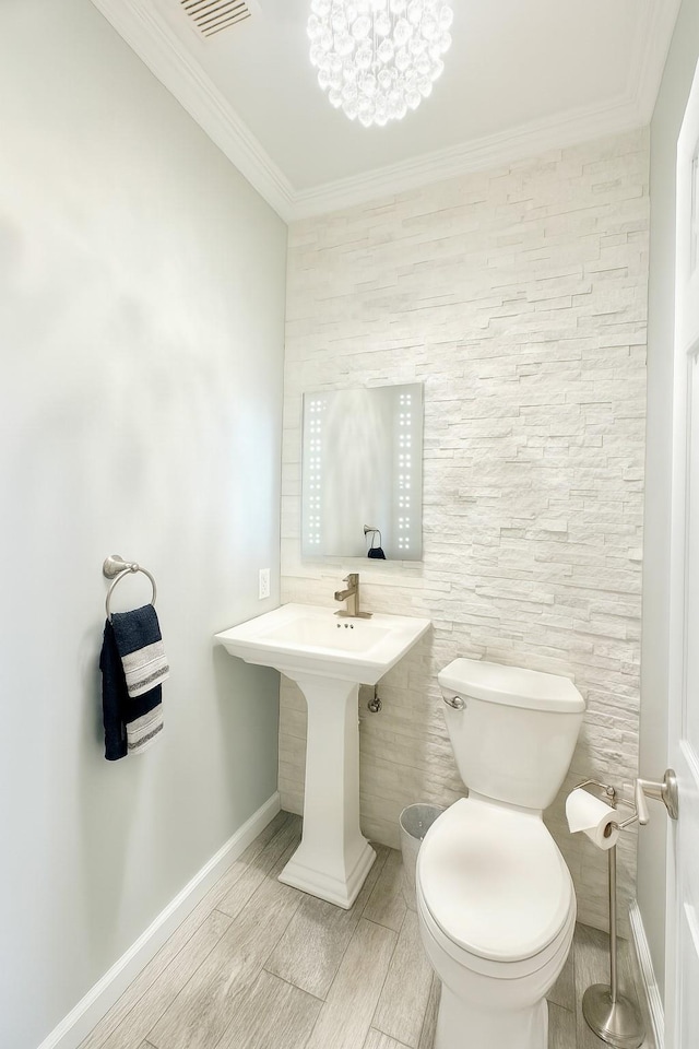 1 Ada Ln, East Setauket, NY 11733 - bathroom featuring crown molding and wood tiled floors