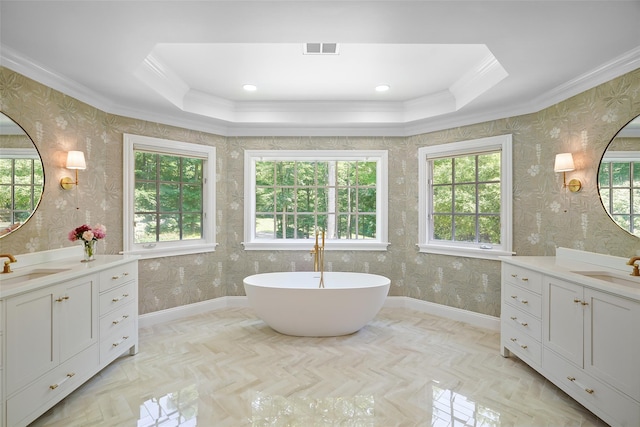 28 Stone Paddock Pl, Bedford, NY 10506 - full bath with ornamental molding, two vanities, a freestanding tub, a tray ceiling, and wallpapered walls