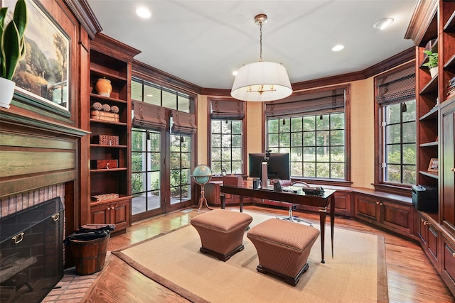 28 Stone Paddock Pl, Bedford, NY 10506 - office space with light wood-type flooring, recessed lighting, a fireplace with flush hearth, and ornamental molding