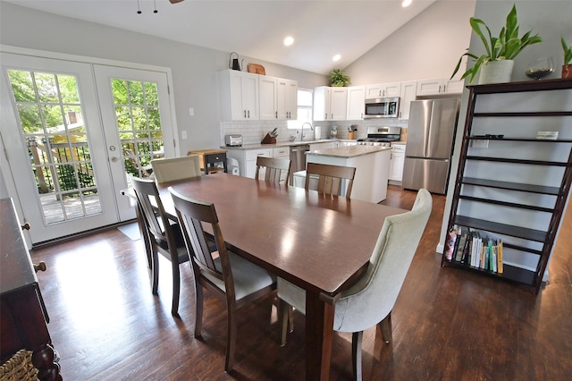6 Zebra Rd, Rocky Point, NY 11778 - dining area featuring healthy amount of natural light, vaulted ceiling, dark wood-style floors, recessed lighting, and a ceiling fan