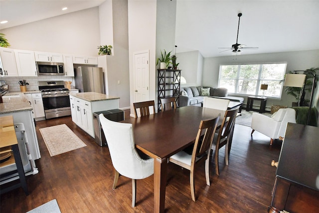 6 Zebra Rd, Rocky Point, NY 11778 - dining room featuring high vaulted ceiling, ceiling fan, dark wood-style flooring, and recessed lighting