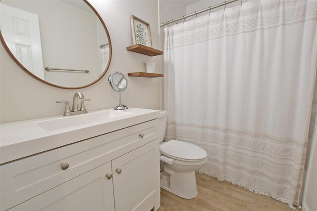 6 Zebra Rd, Rocky Point, NY 11778 - full bath with vanity and wood finished floors