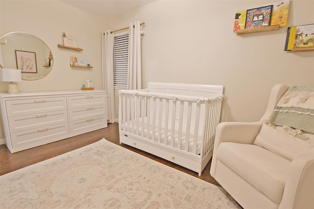 6 Zebra Rd, Rocky Point, NY 11778 - bedroom with a nursery area and dark wood-style flooring