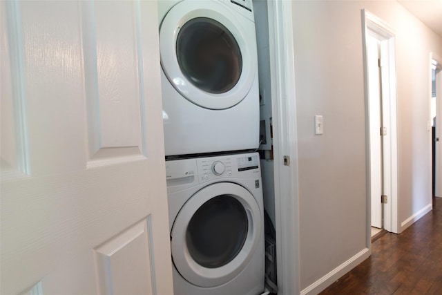 6 Zebra Rd, Rocky Point, NY 11778 - laundry area featuring stacked washing machine and dryer and dark wood-style flooring