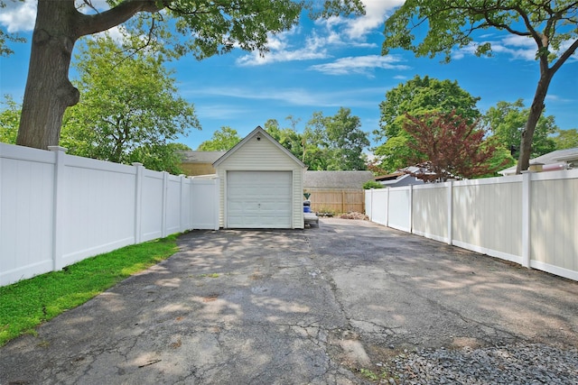 6 Zebra Rd, Rocky Point, NY 11778 - garage with asphalt driveway