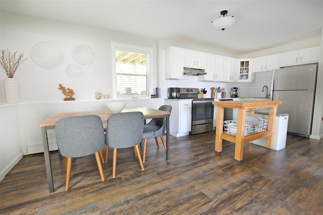 6 Zebra Rd, Rocky Point, NY 11778 - kitchen with appliances with stainless steel finishes, under cabinet range hood, glass insert cabinets, white cabinets, and dark wood-type flooring