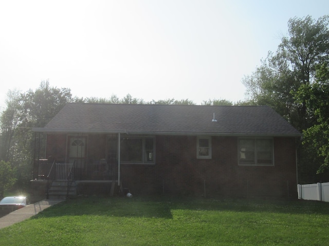 22 Booth Blvd, Wappingers Falls, NY 12590 - ranch-style home with a porch, a front lawn, and brick siding