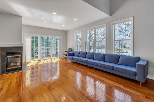 1200 Half Moon Bay Dr, Croton-On-Hudson, NY 10520 - living room with hardwood / wood-style flooring, a multi sided fireplace, and recessed lighting