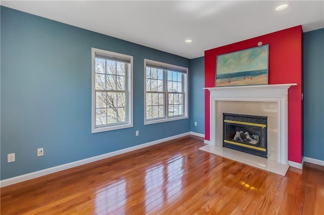 1200 Half Moon Bay Dr, Croton-On-Hudson, NY 10520 - unfurnished living room with a fireplace with flush hearth, wood finished floors, and recessed lighting