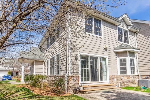 1200 Half Moon Bay Dr, Croton-On-Hudson, NY 10520 - back of property featuring stone siding and entry steps