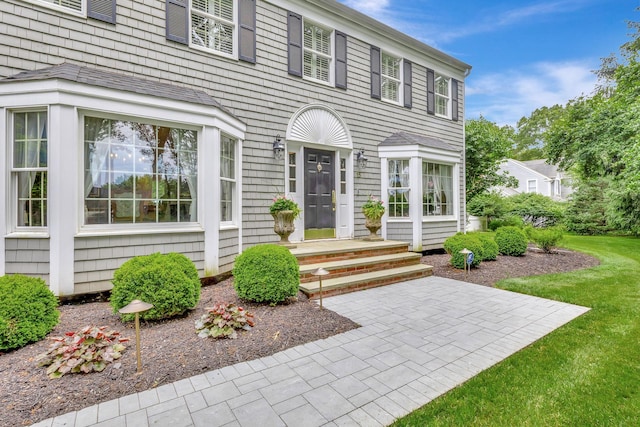 15 Hermitage St, Wading River, NY 11792 - doorway to property featuring a yard