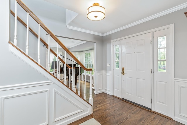 15 Hermitage St, Wading River, NY 11792 - foyer entrance with dark wood-style floors, stairway, a wainscoted wall, ornamental molding, and a decorative wall