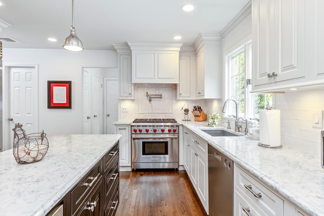 15 Hermitage St, Wading River, NY 11792 - kitchen featuring stainless steel appliances, white cabinetry, light stone counters, and recessed lighting