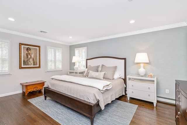 15 Hermitage St, Wading River, NY 11792 - bedroom with a baseboard heating unit, wood finished floors, crown molding, and recessed lighting